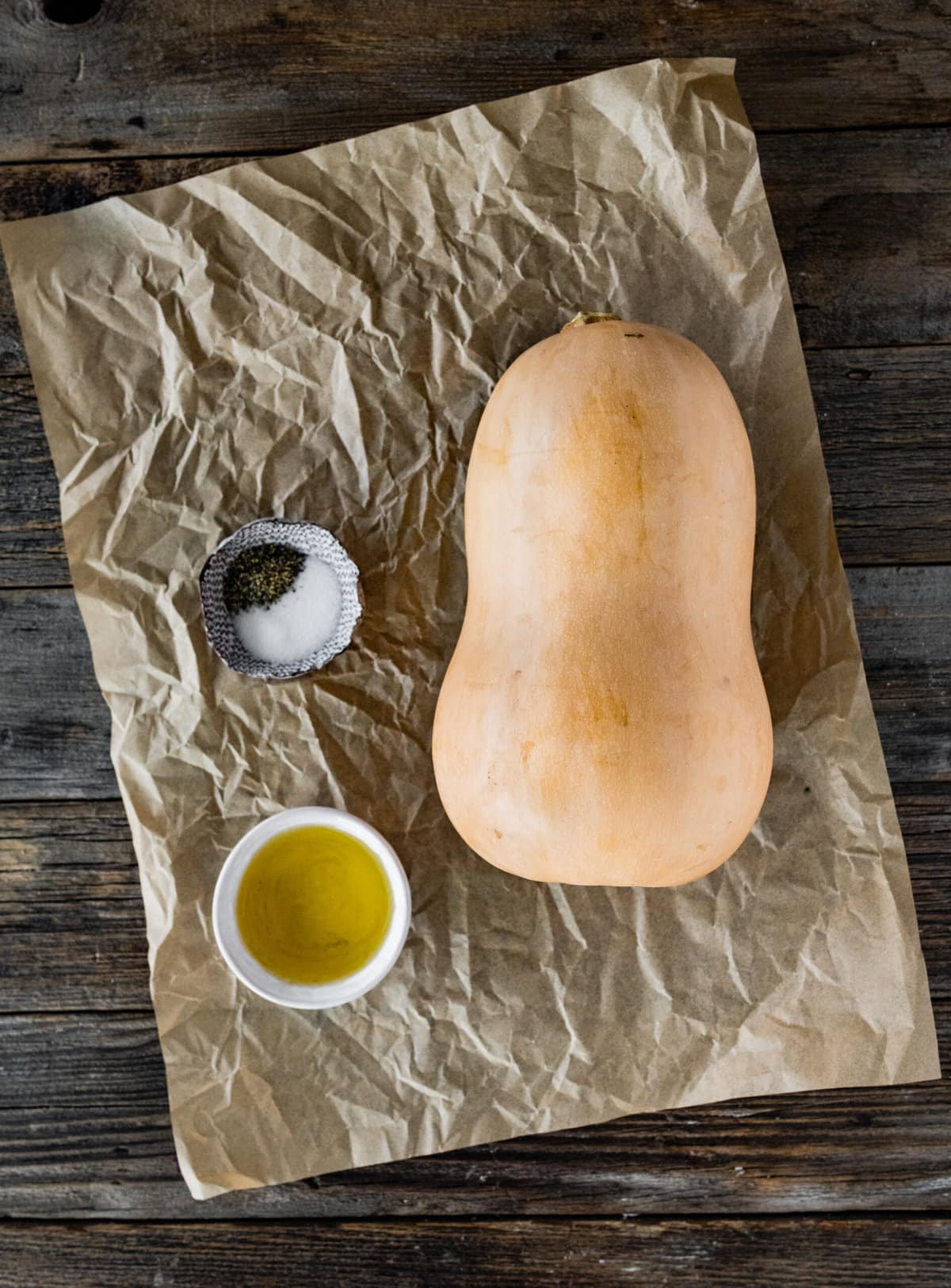 How to Cook Butternut Squash Whole in Oven Recipe- prepping the butternut squash with salt and pepper.