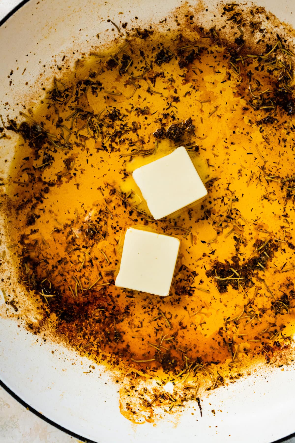 How to make Juicy Oven baked Chicken Breast Recipe: adding butter to pan before cooking veggies.