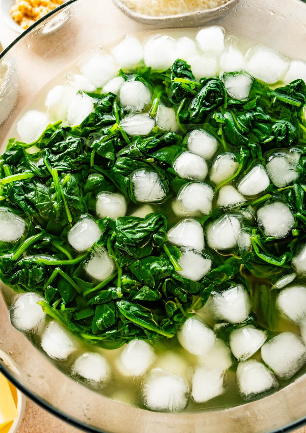 How to make Best Steakhouse Creamed Spinach Recipe- blanching the spinach in ice bath.