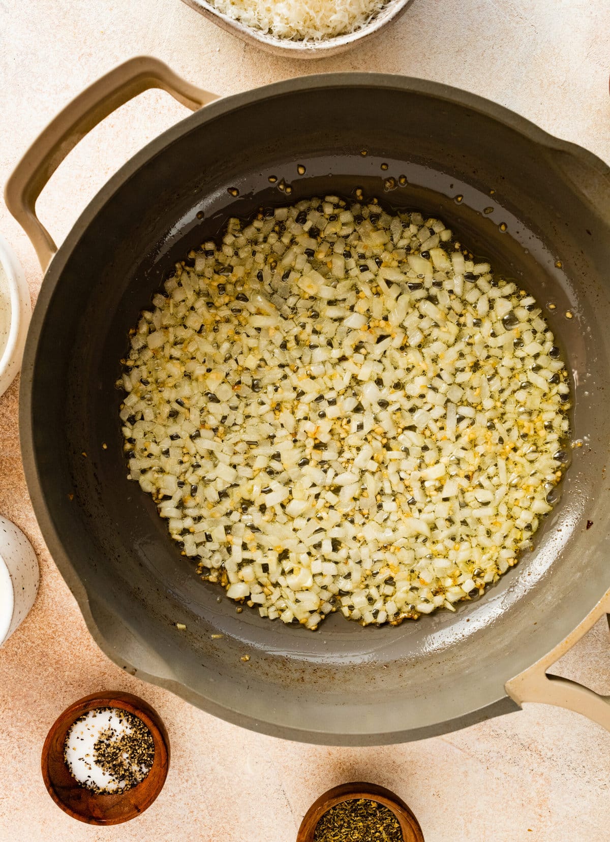 How to make Best Steakhouse Creamed Spinach Recipe- sautéing the onions in pan.