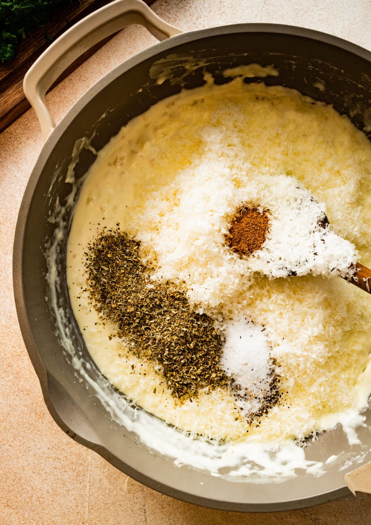 How to make Best Steakhouse Creamed Spinach Recipe- stirring in cheese and seasonings.