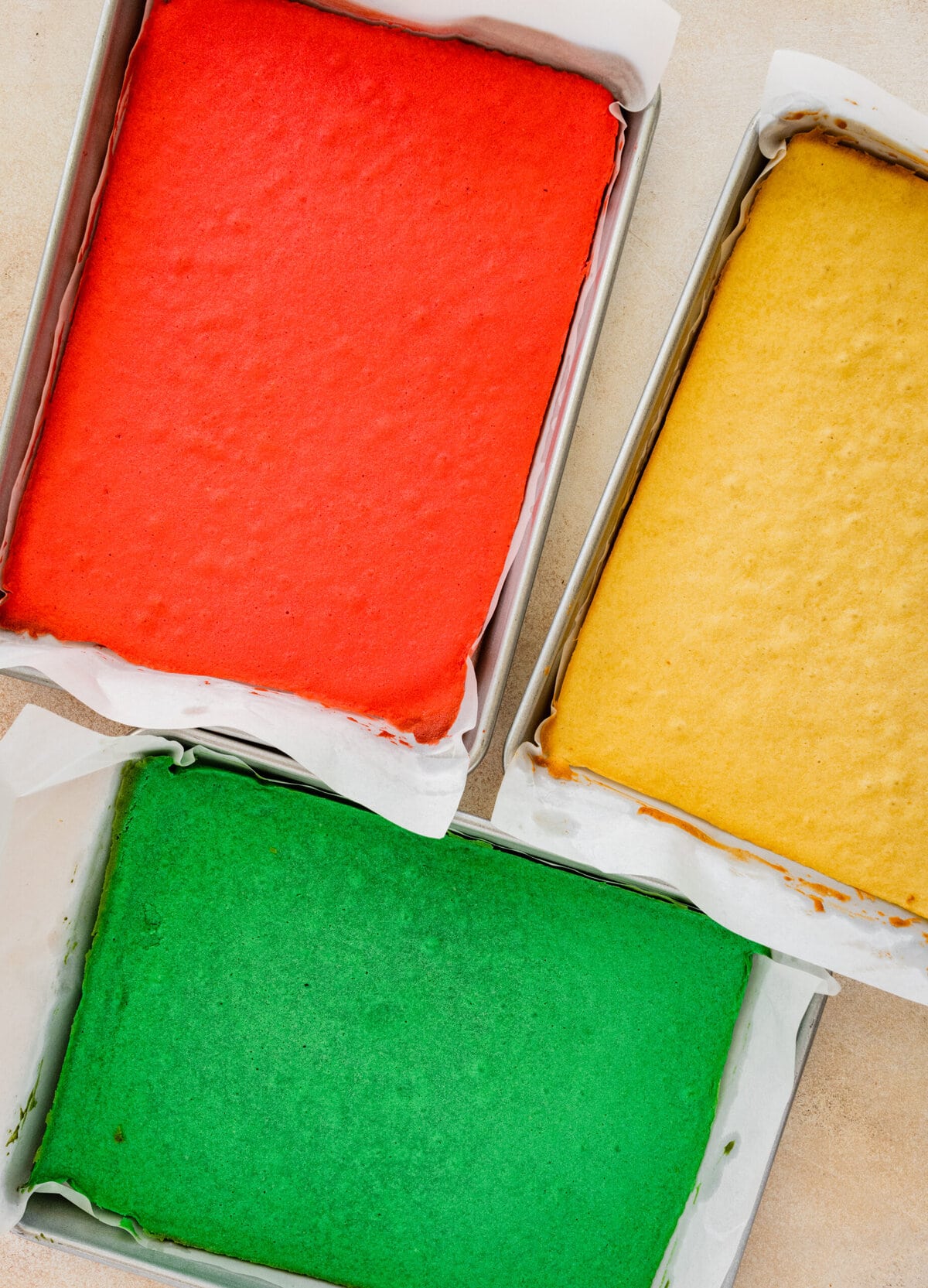 How to make Calssic Italian Rainbow Cookies Step-by-Step Instructions: putting batter in pans and baking.