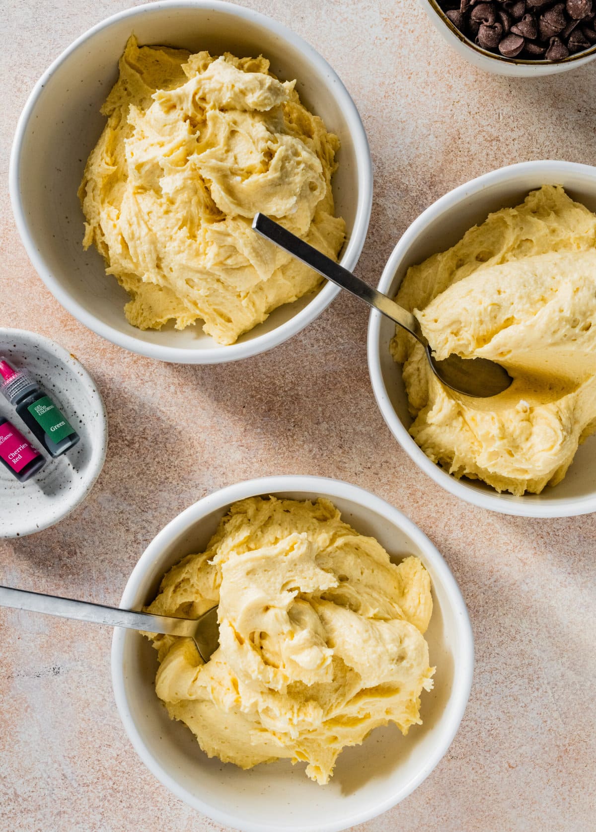 How to make Calssic Italian Rainbow Cookies Step-by-Step Instructions: dividing the dough in three bowls.