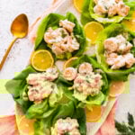 shrimp salad with old bay seasoning in lettuce cups on a pretty platter.