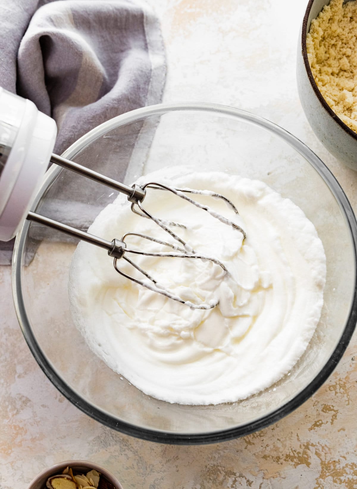 How to make easy almond cake recipe step by step: whipping the egg whites.