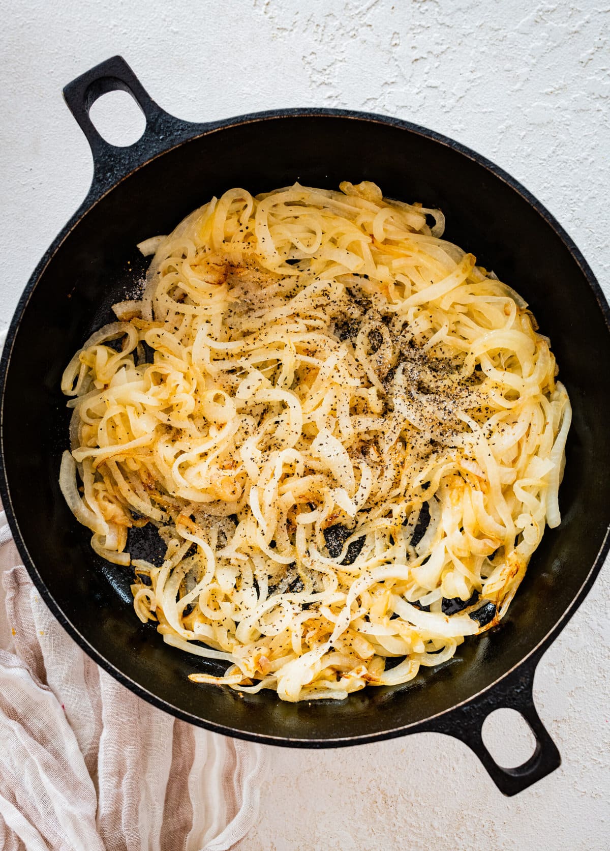 How to make caramelized onions for leftover prime rib sandwich recipe: sauté onions with butter.
