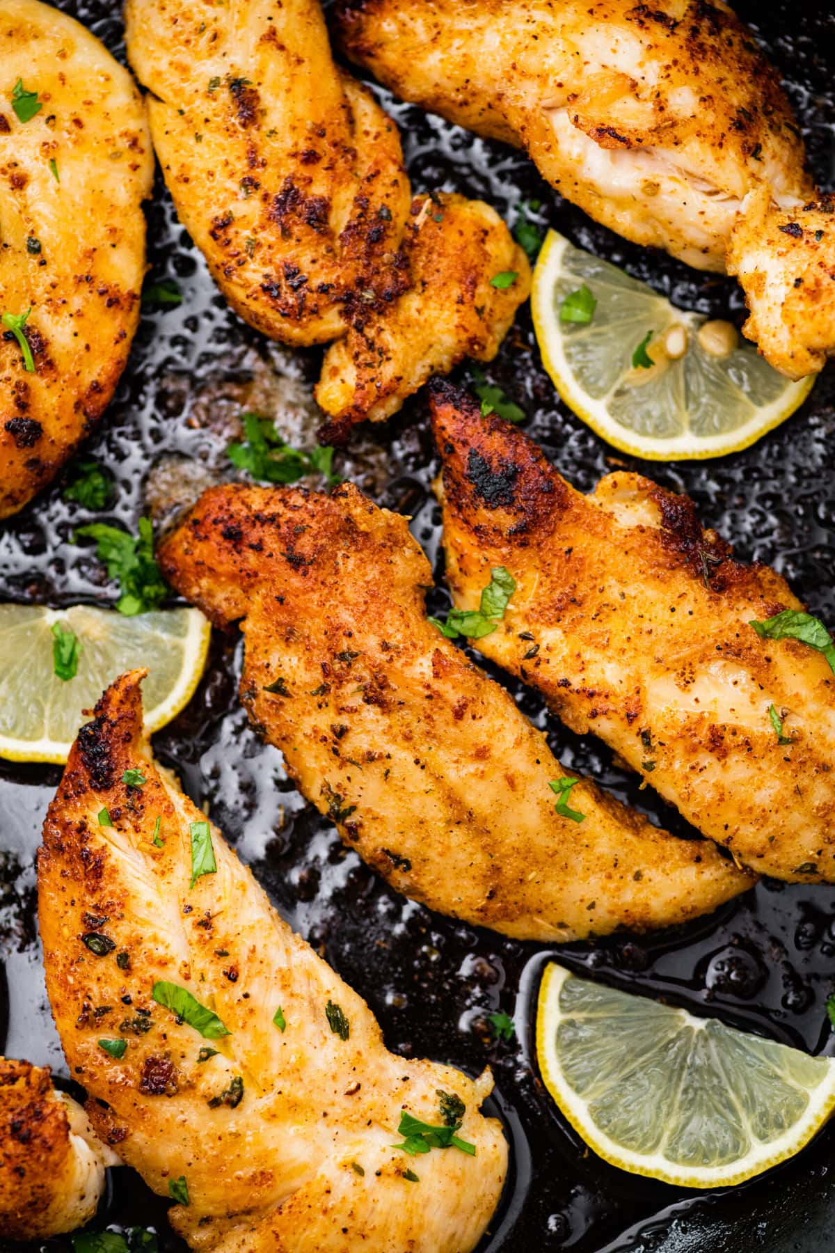 cooked tenders in a cast iron skillet. Seasoned with a little parsley and lemon wedges.