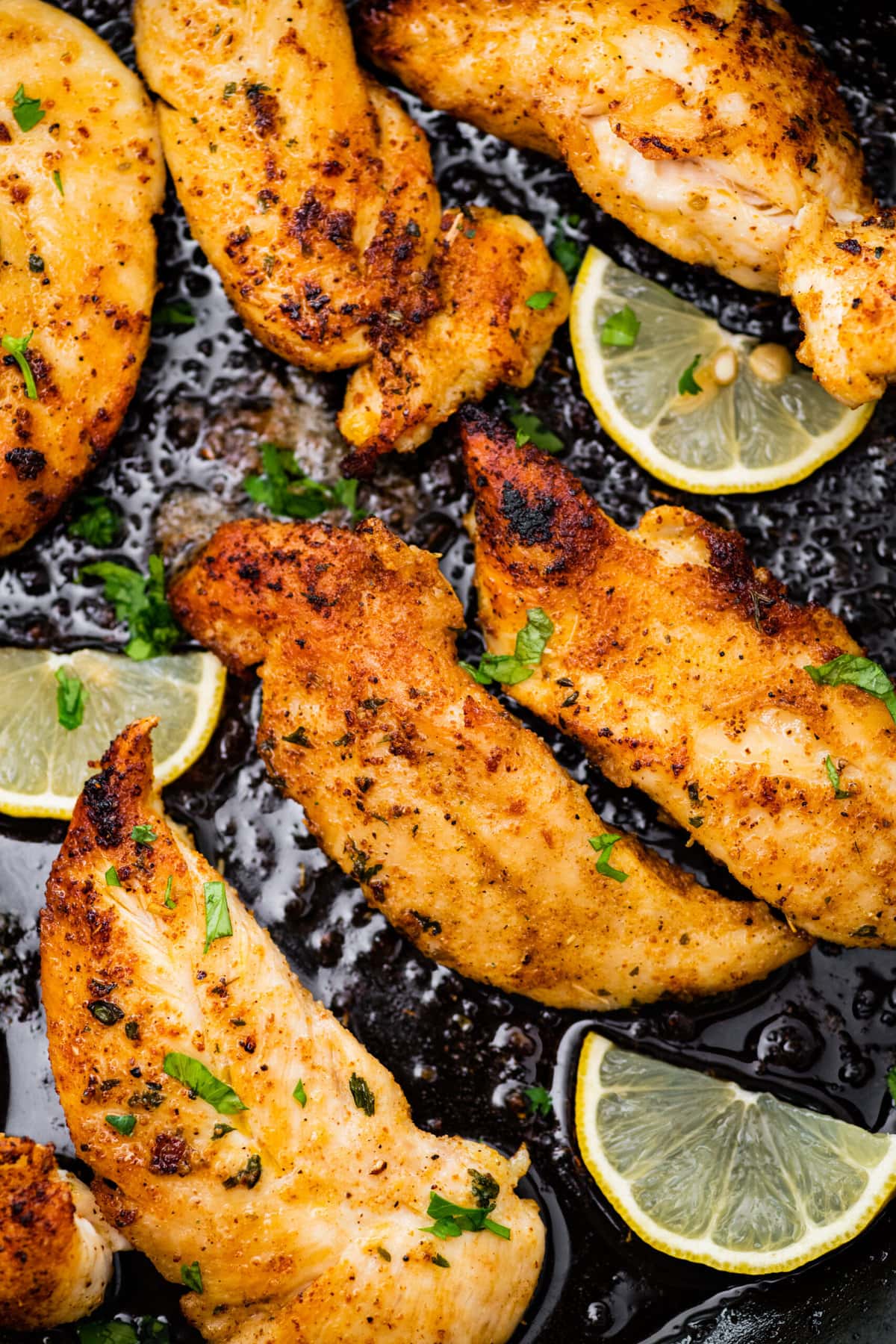 cooked tenders in a cast iron skillet. Seasoned with a little parsley and lemon wedges. 