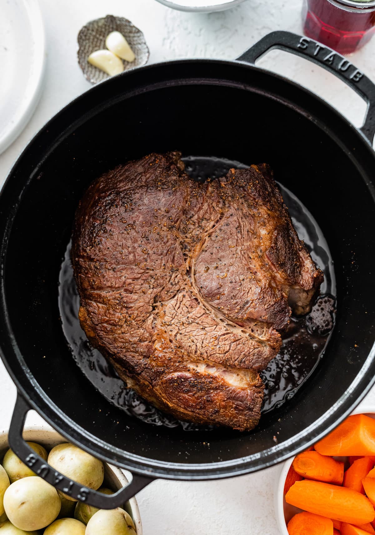 How to make the best perfect pot roast: brown the meat on both sides in a pot.