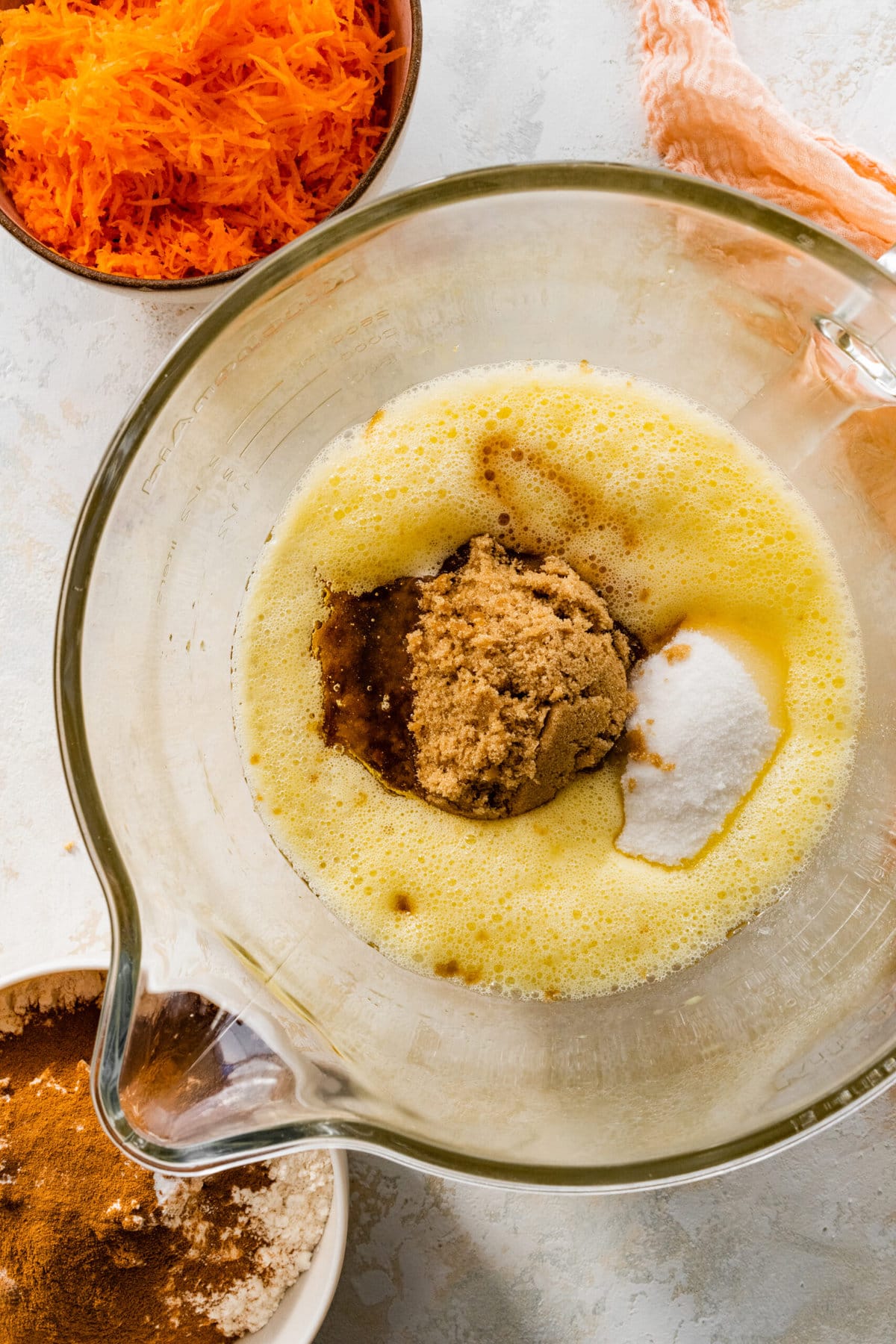 How to make easy carrot cake step-by-step photos: Mixing all the wet ingredients in the bowl.