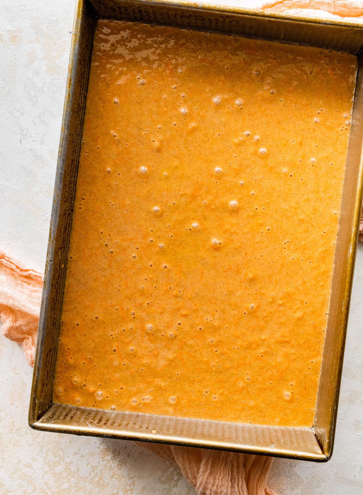 How to make easy carrot cake step-by-step photos: putting the cake batter in the pan.