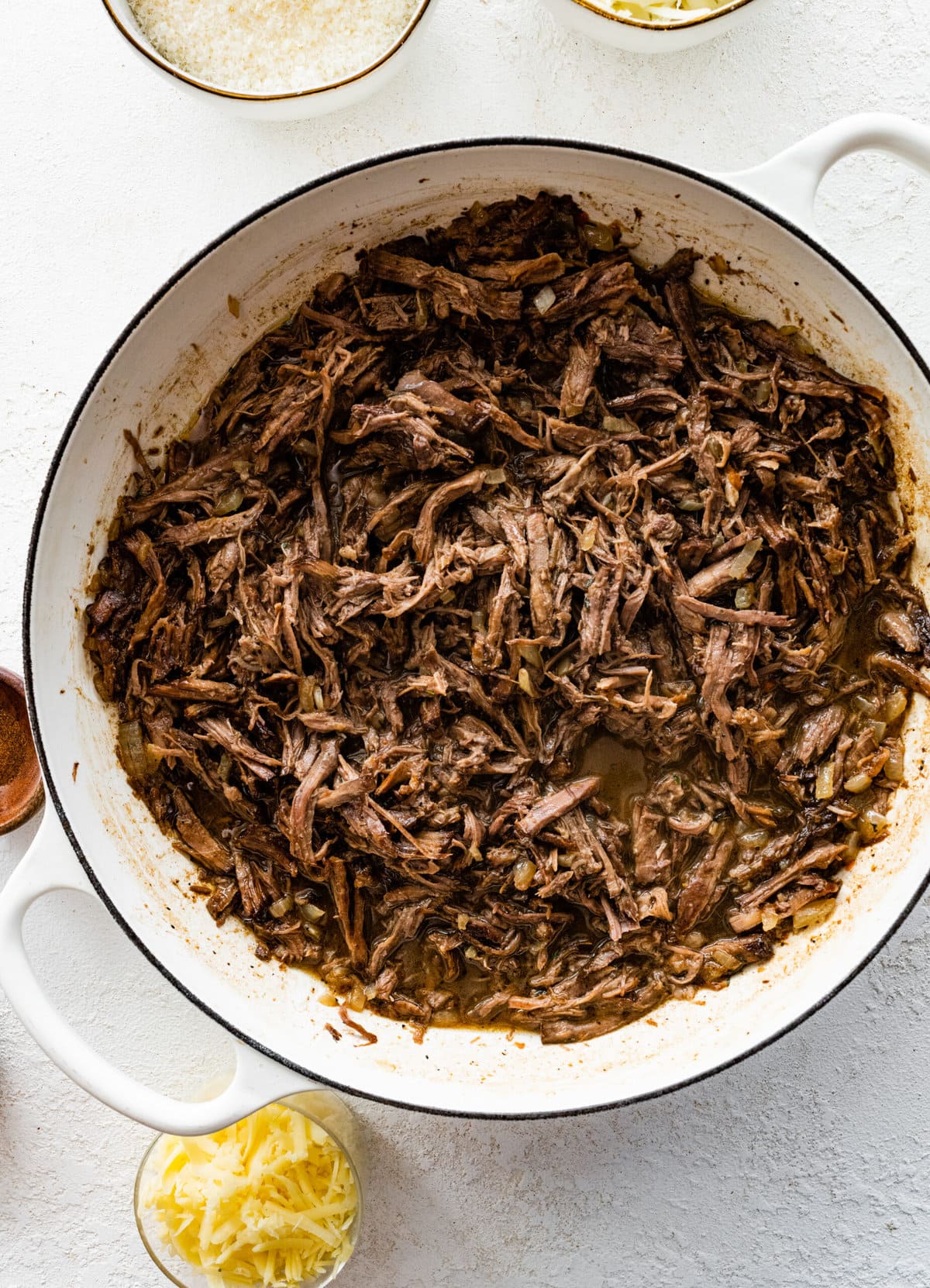 How to make leftover pot roast casserole step-by-step instructions: shred the leftover pot roast.