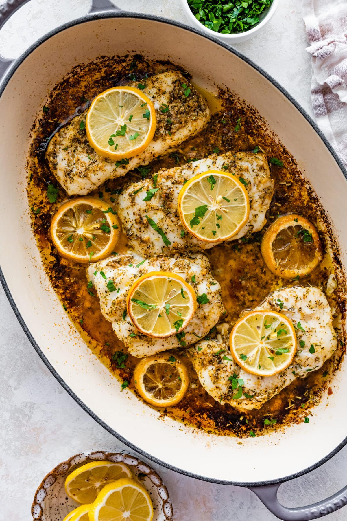 finished oven baked cod in the oven.