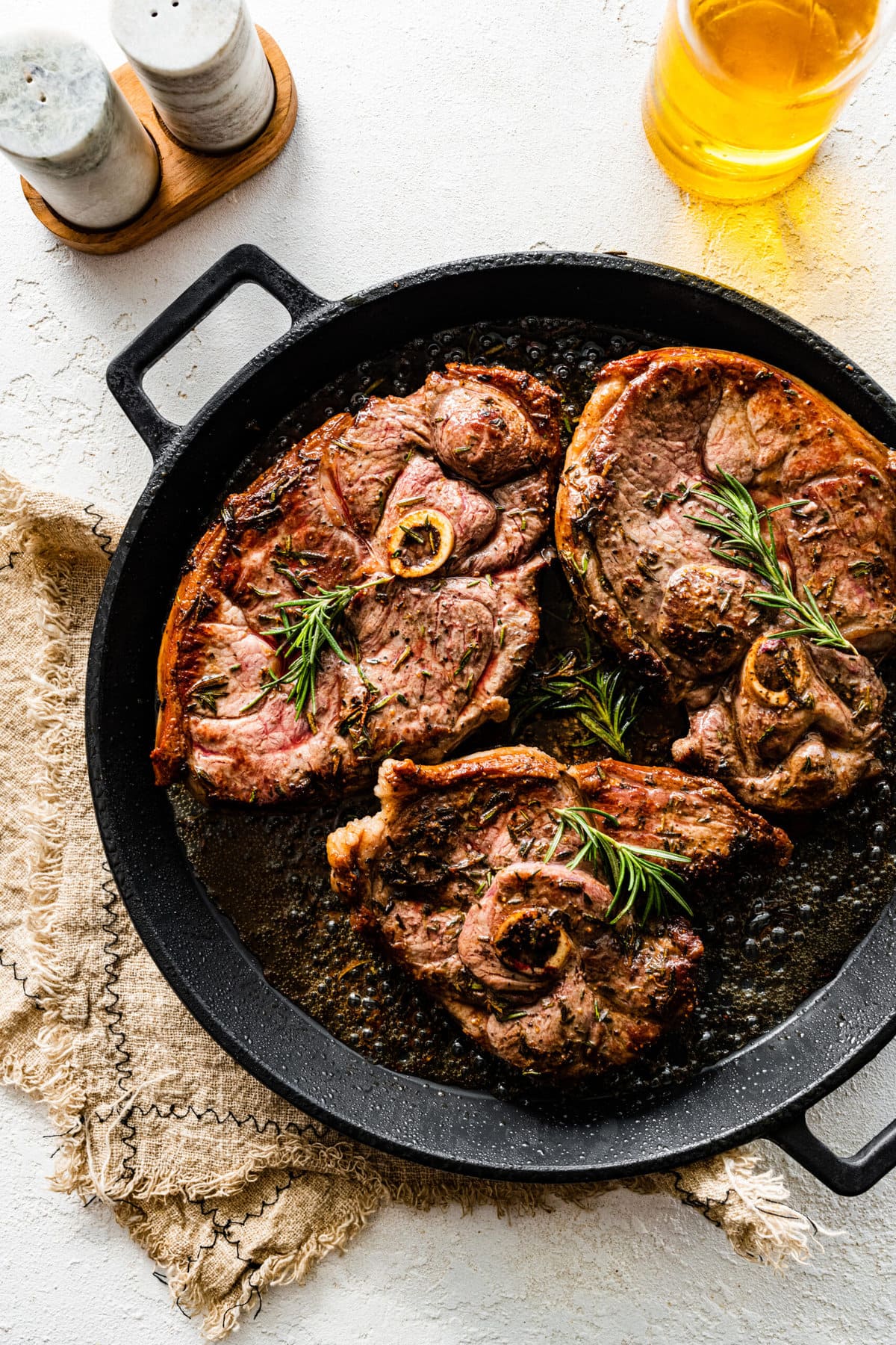 How to make lamb should chops step-by-step: searing lamb chops on both sides.