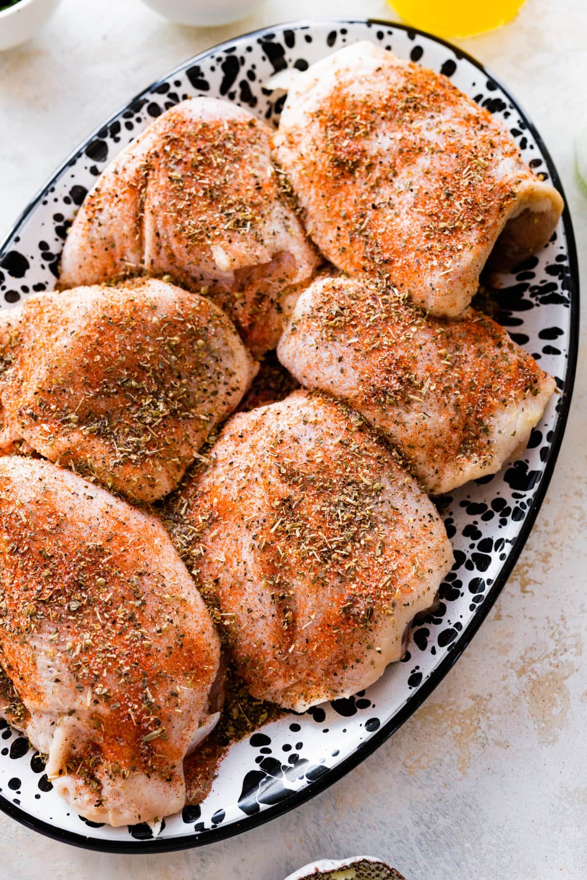 seasoned chicken thighs ready to cook.