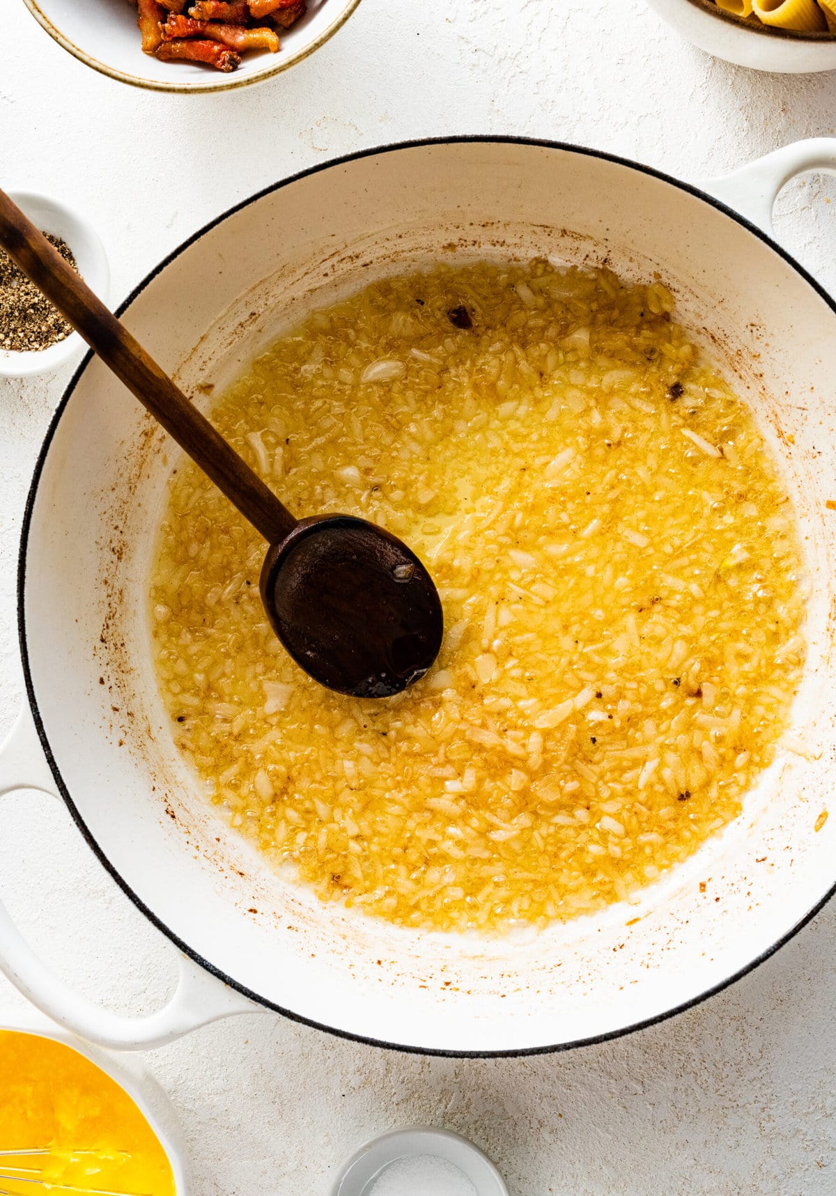 how to make pasta alla zozzona recipe instructions- cooked onion in pan.