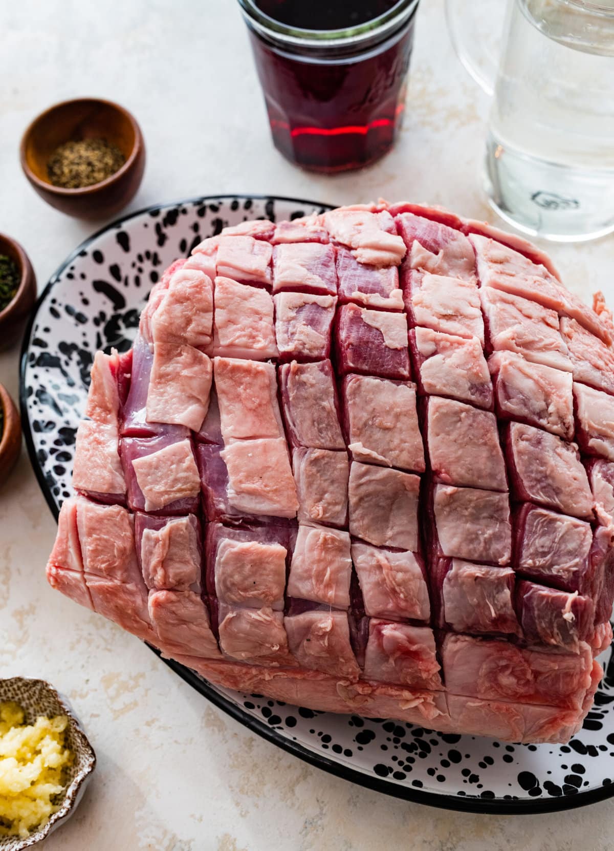 How to make roast leg of lamb step-by-step: scoring the top of the lamb.