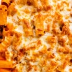 baked cheesy classic pasta al forno recipe out of the oven in a white baking pan.