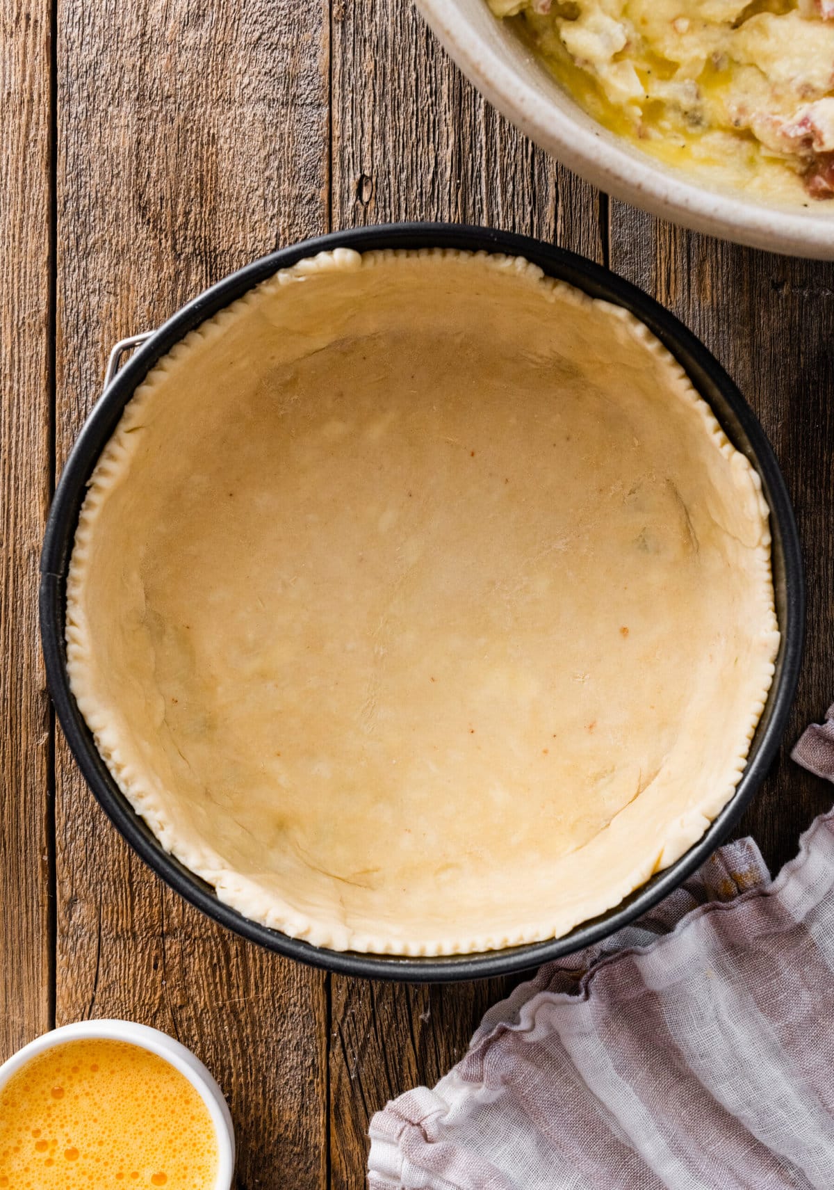 How to make authentic pizza rustica step-by-step: make the crust and place in the pan.