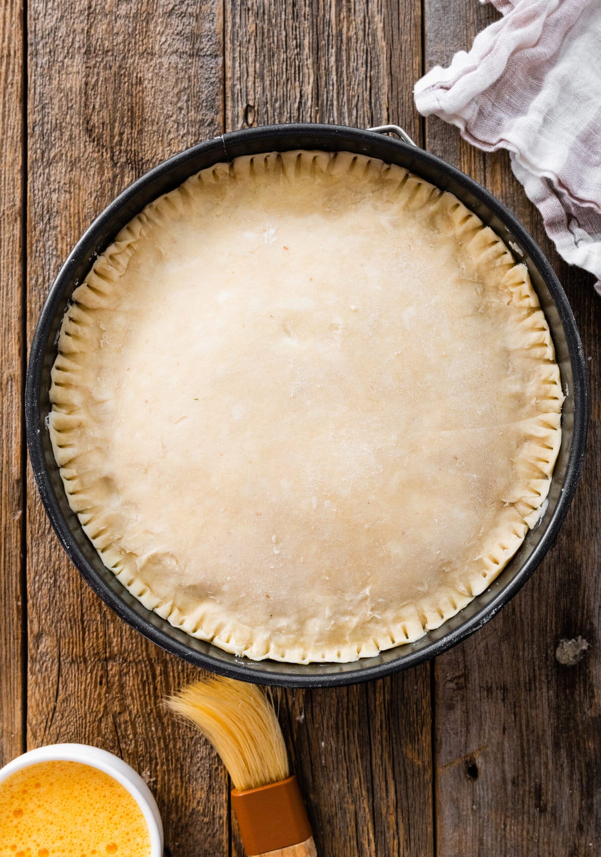 How to make authentic pizza rustica step-by-step: cover with the top crust.