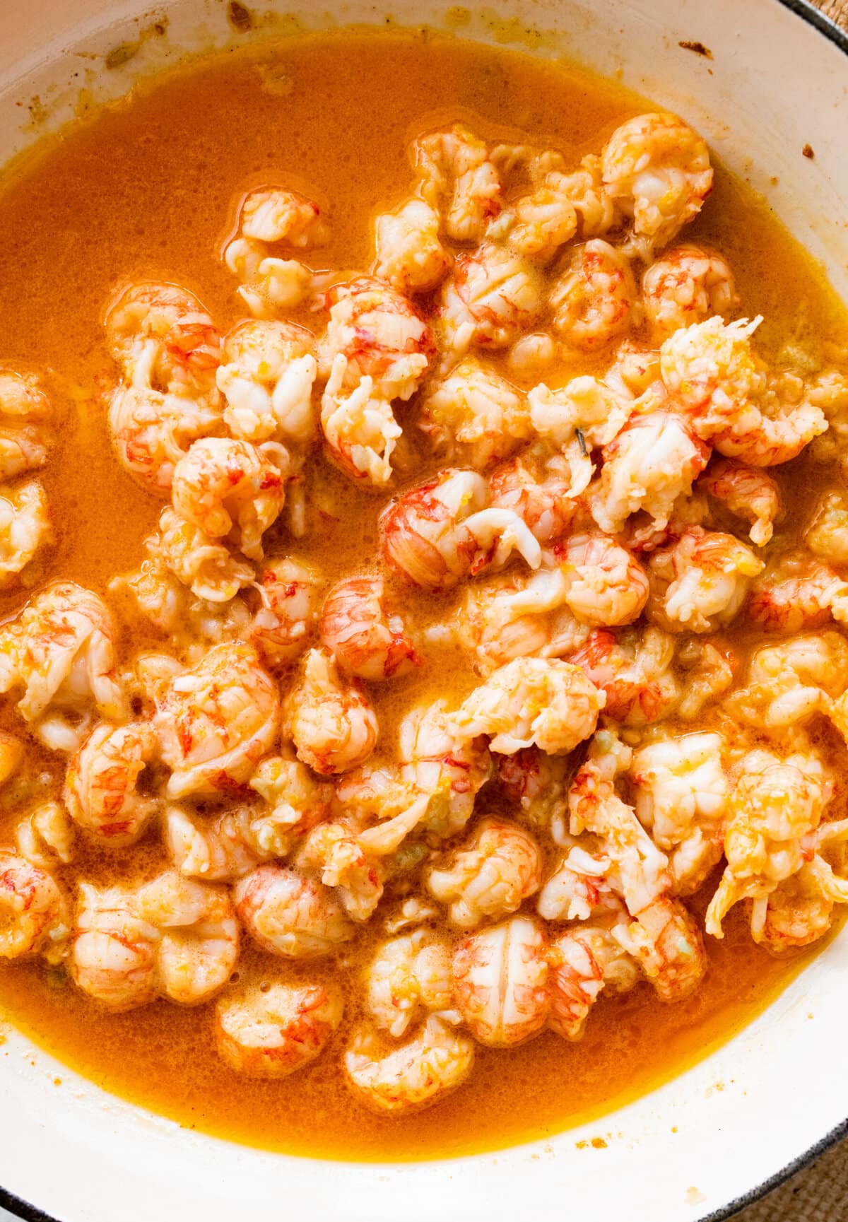 How to make amazing langostino lobster rolls step-by-step instructions: cooked langostino in pan with the sauce.