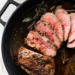 cover photo for tri tip steak on a skillet.