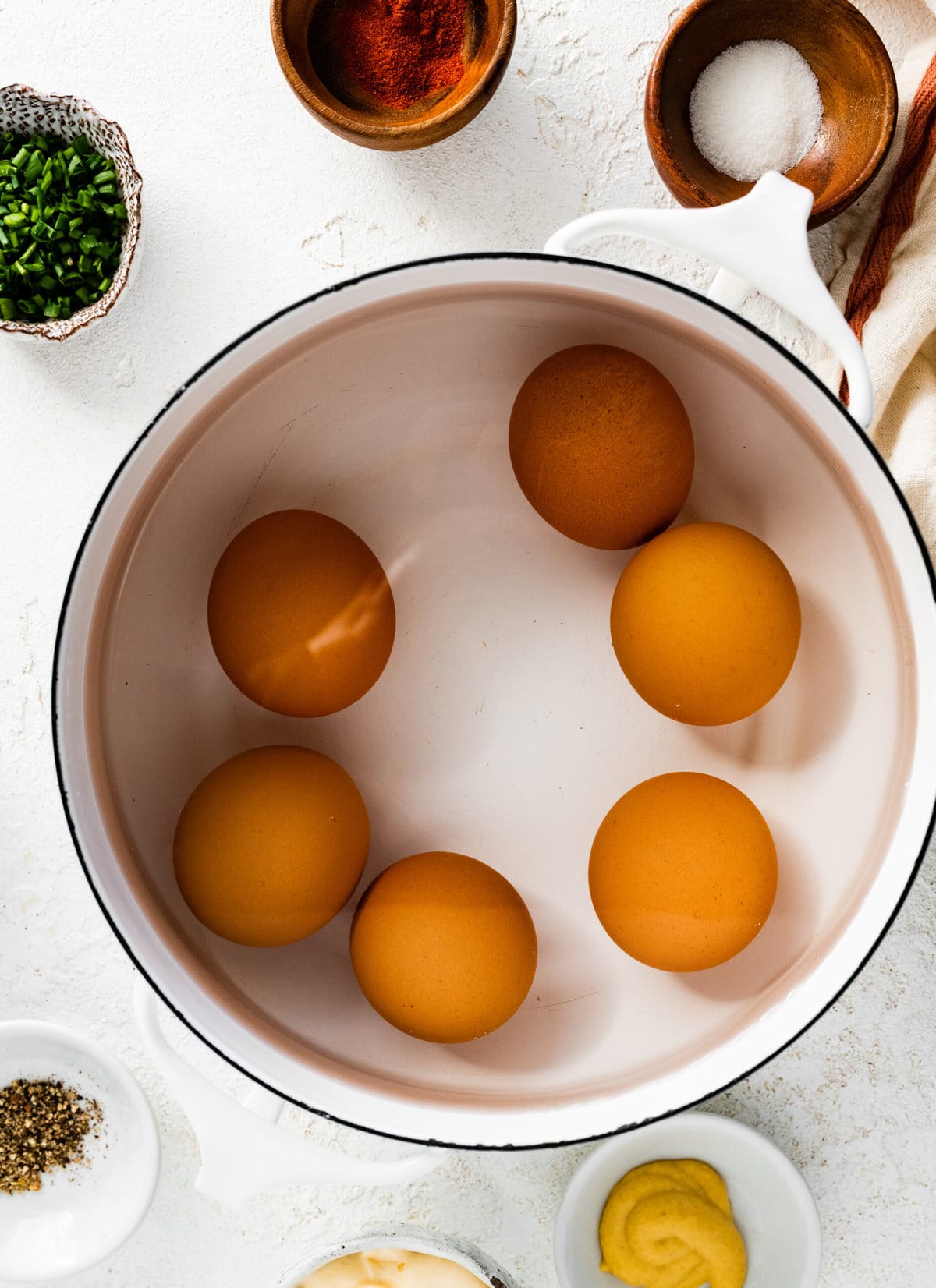 How to make classic deviled eggs step-by-step instructions: boiling the eggs in water.