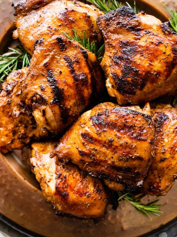 plate of grilled chicken thighs. Cover photo.