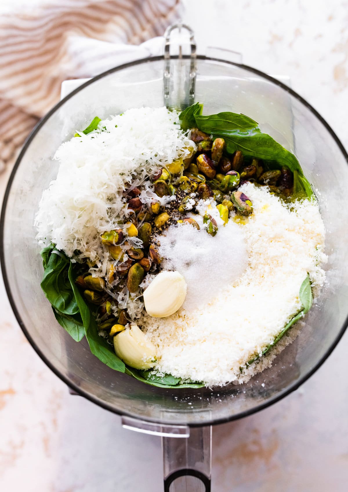 How to make the best pistachio pesto (step-by-step): add all the ingredients to a blender and pulse until well combined.