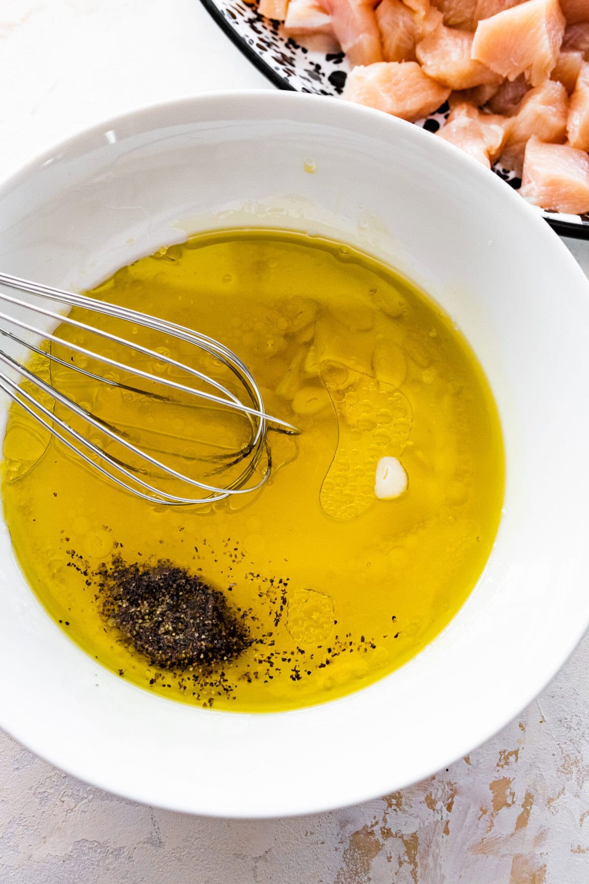 how to make chicken spiedini step-by-step: add the marinade to a bowl.