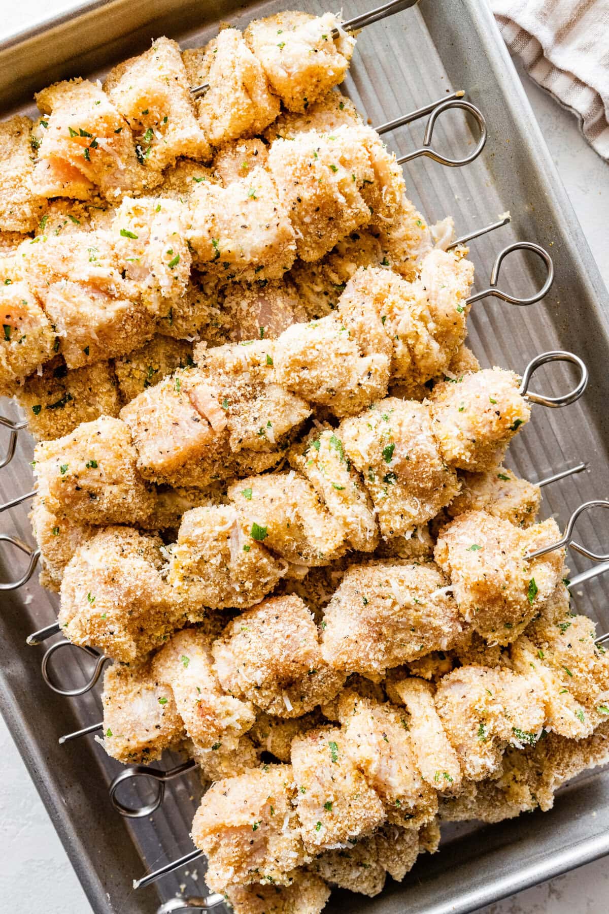 how to make chicken spiedini step-by-step: all the chicken on metal skewers.