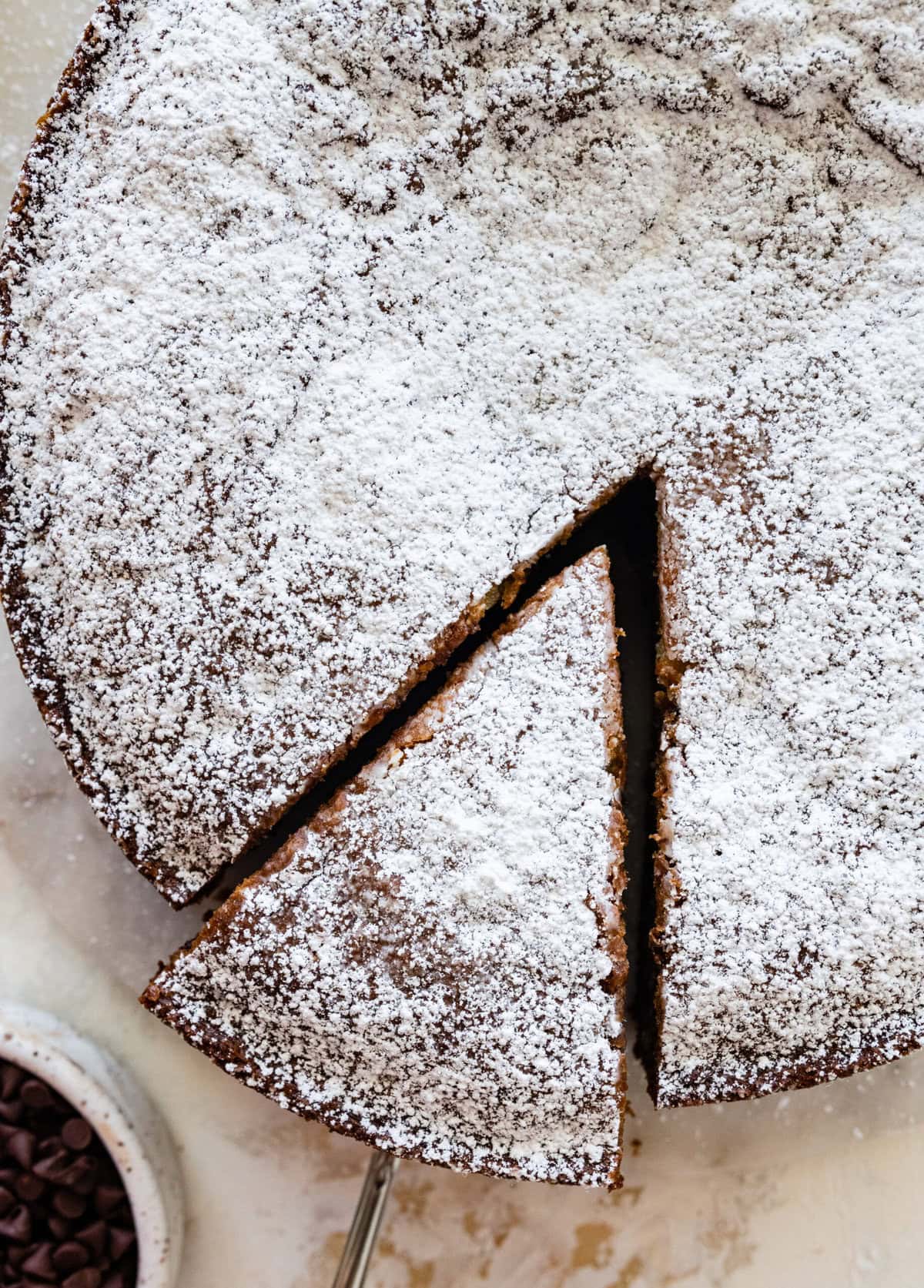 slice cut out of the chocolate chip ricotta cake.