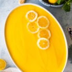 How to make Lemon Tiramisu with lemon curd step by step: lemon tiramisu after resting overnight. Decorate with lemons on top.