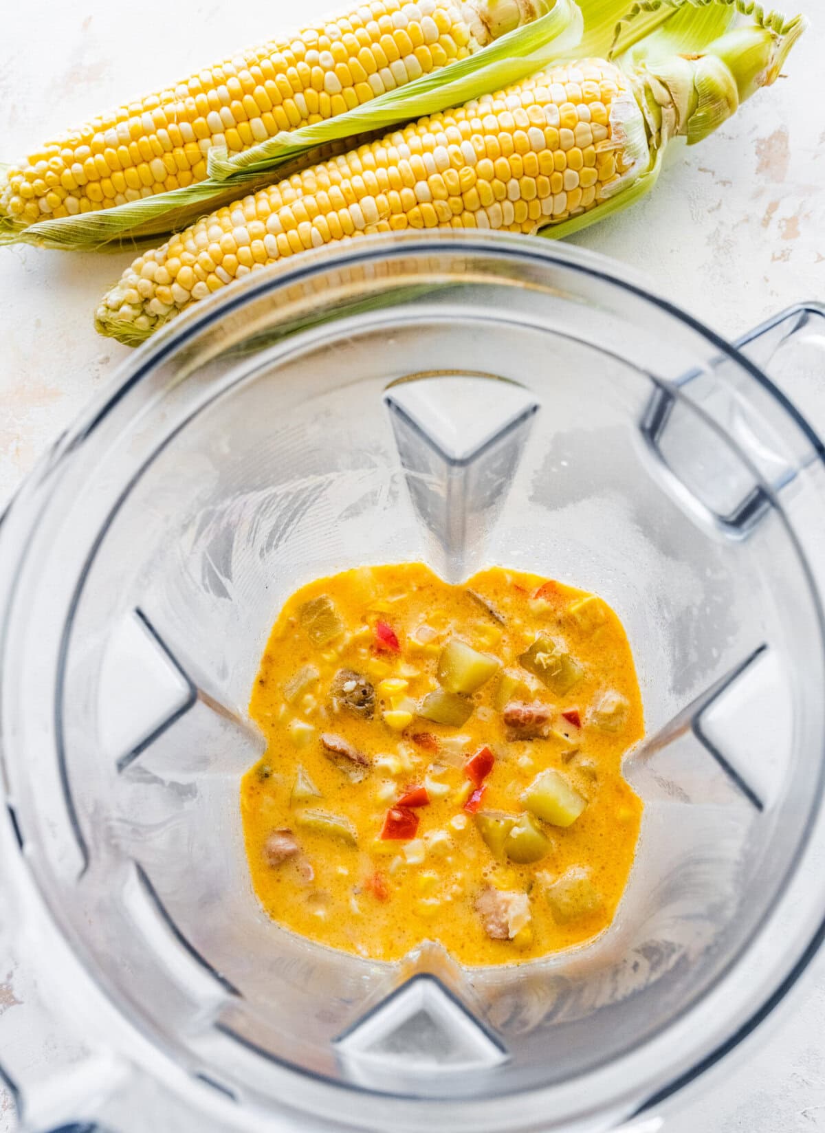 How to make simple summer corn chowder step-by-step: blend some of the soup.