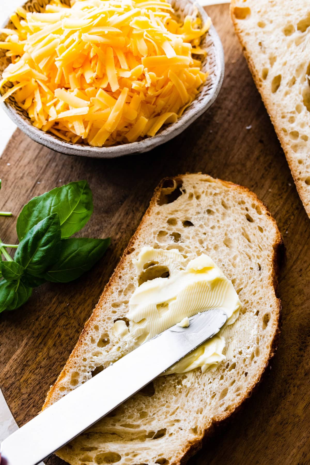 how to make the grilled cheese sandwich- butter the bread on both sides.