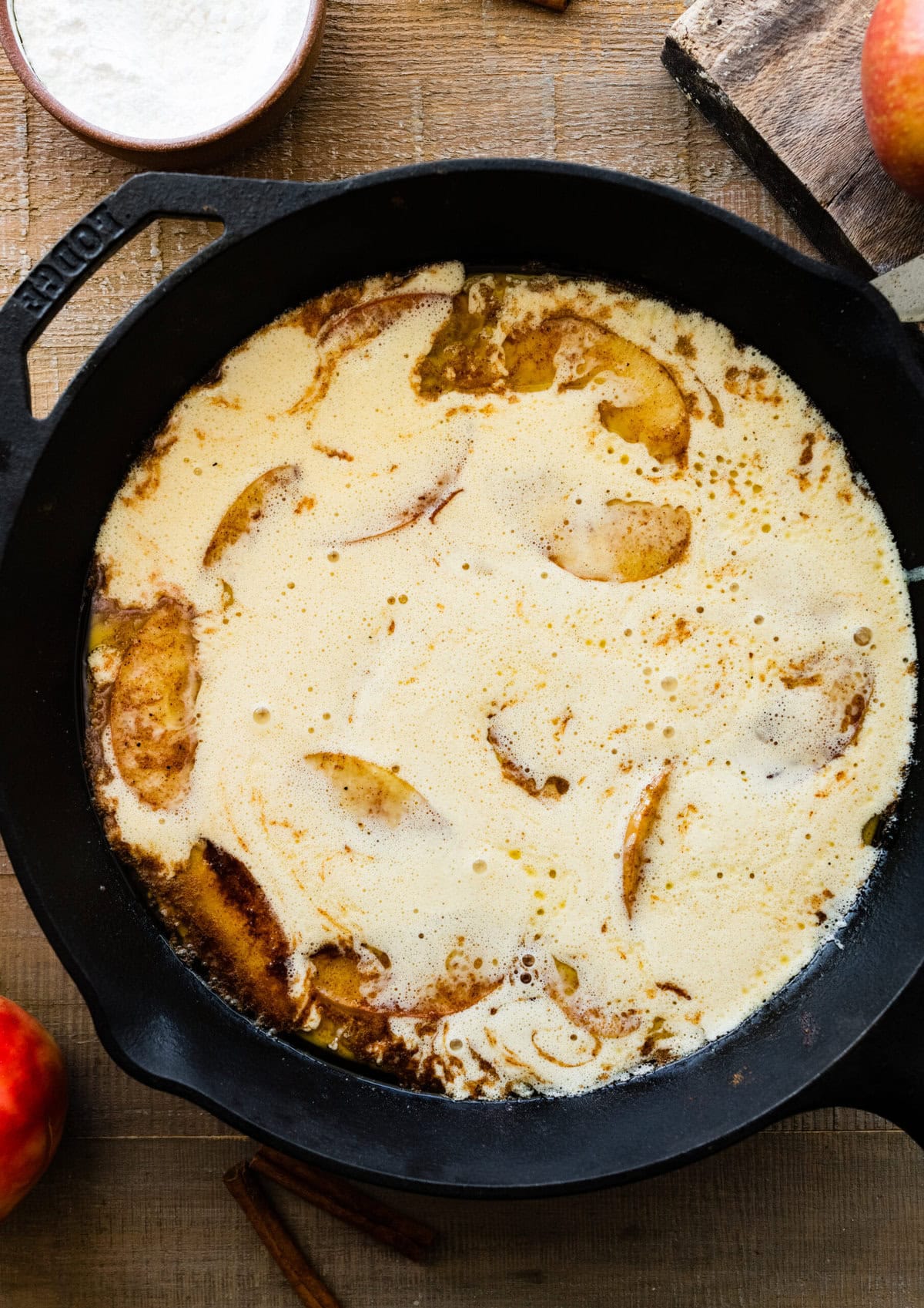 How to make German Apple Pancake- batter in pan and ready to bake i the oven.