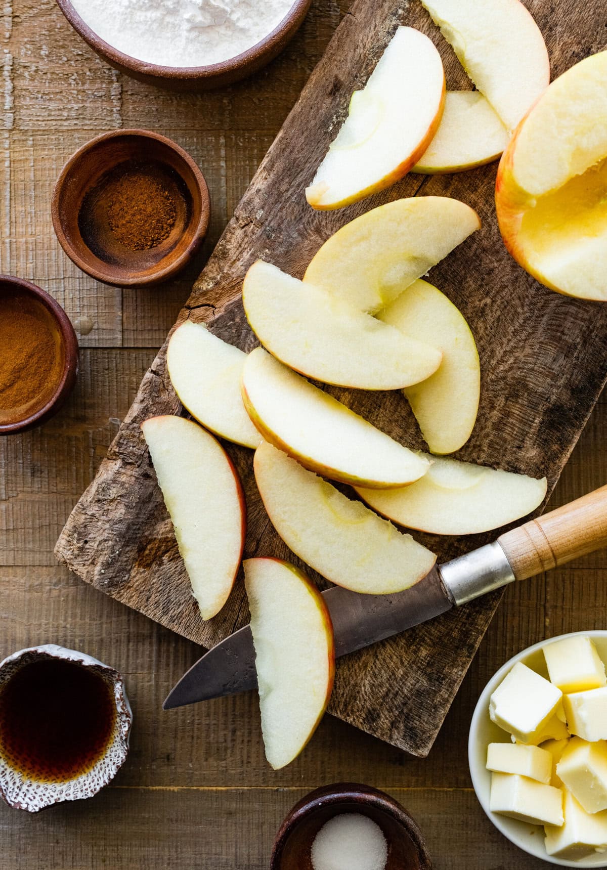 How to make German Apple Pancake- cutting the apples into slices.