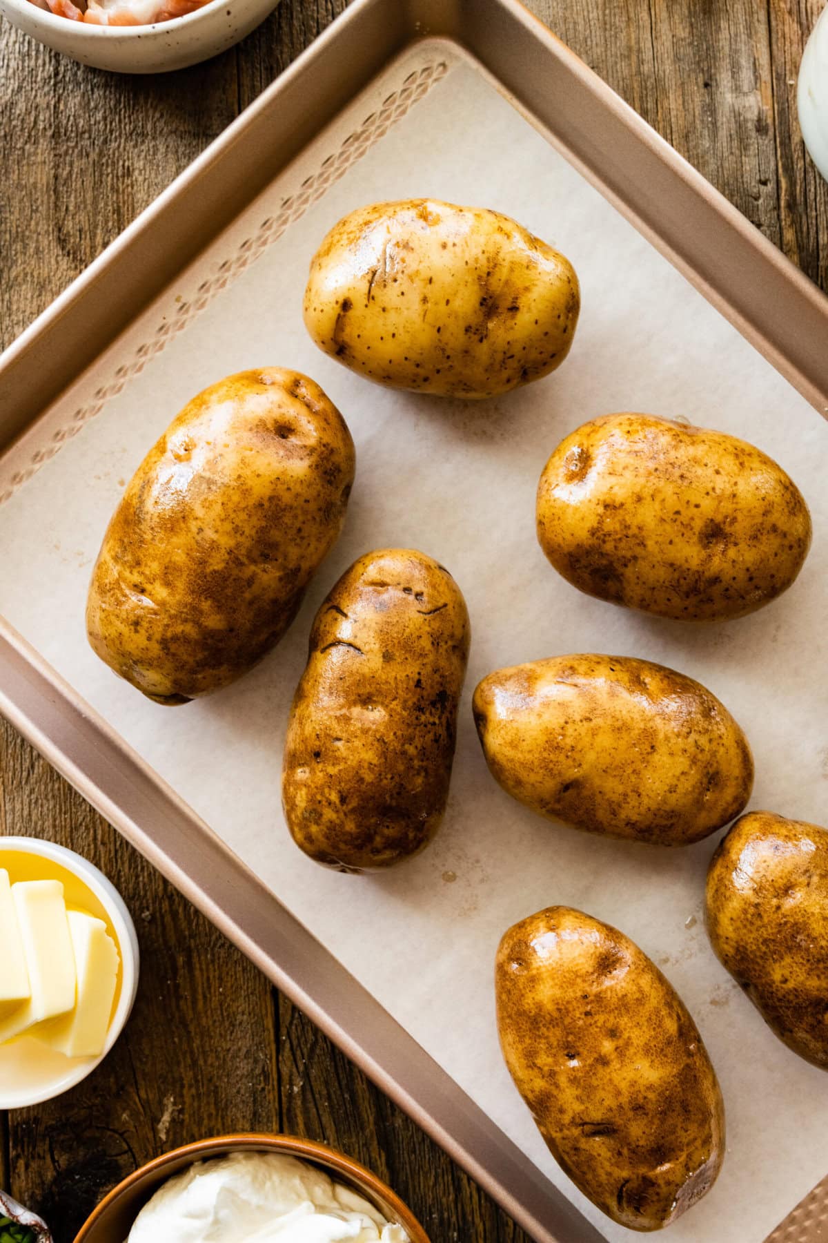 How to make Best Outback Baked Potato Soup Copycat Recipe - bake the potatoes in the oven. Rub them with oil before baking.