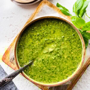Spoon in a bowl of pesto Genovese.