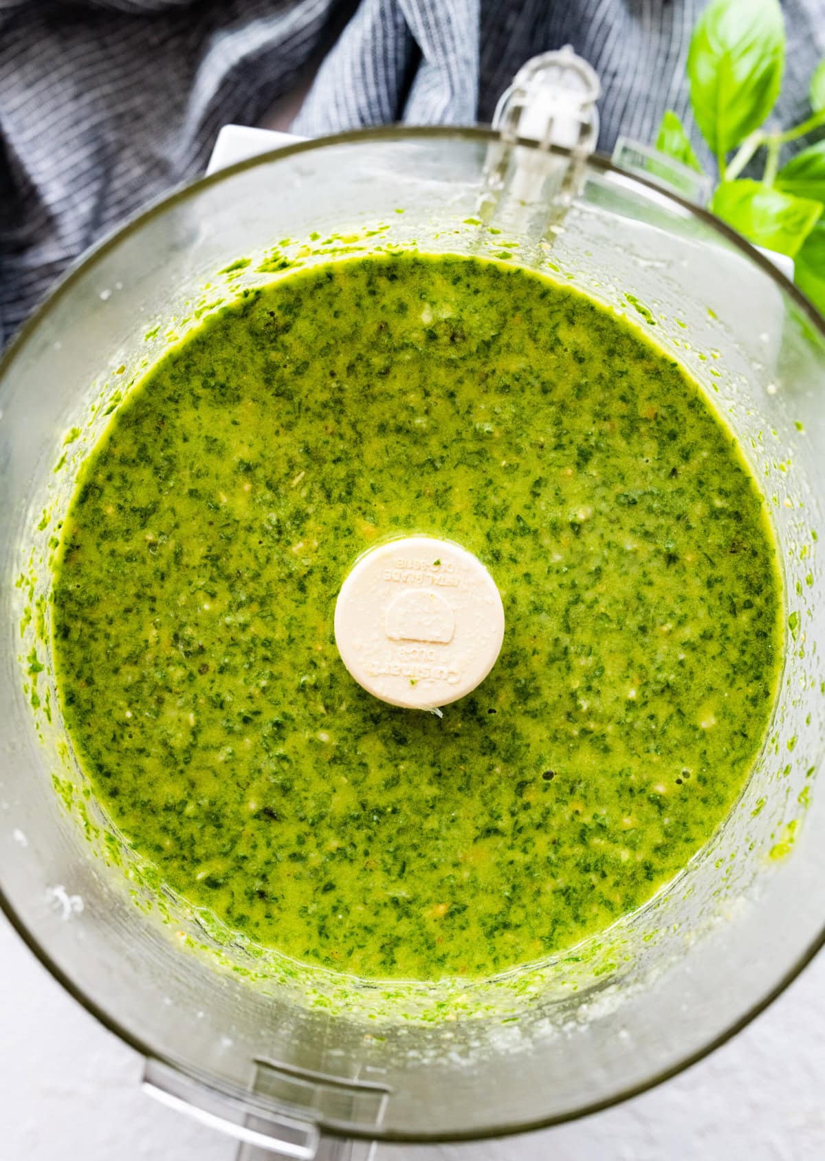 how to make basil pesto- blend the ingredients until smooth.