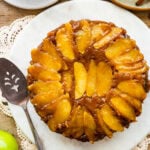 Caramel Apple Upside Down Cake Recipe on a platter. The caramel apple layer is visible on the top.