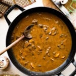 How to make easy mushroom gravy recipe (step-by-step)- add mushrooms back to the pan and combine.
