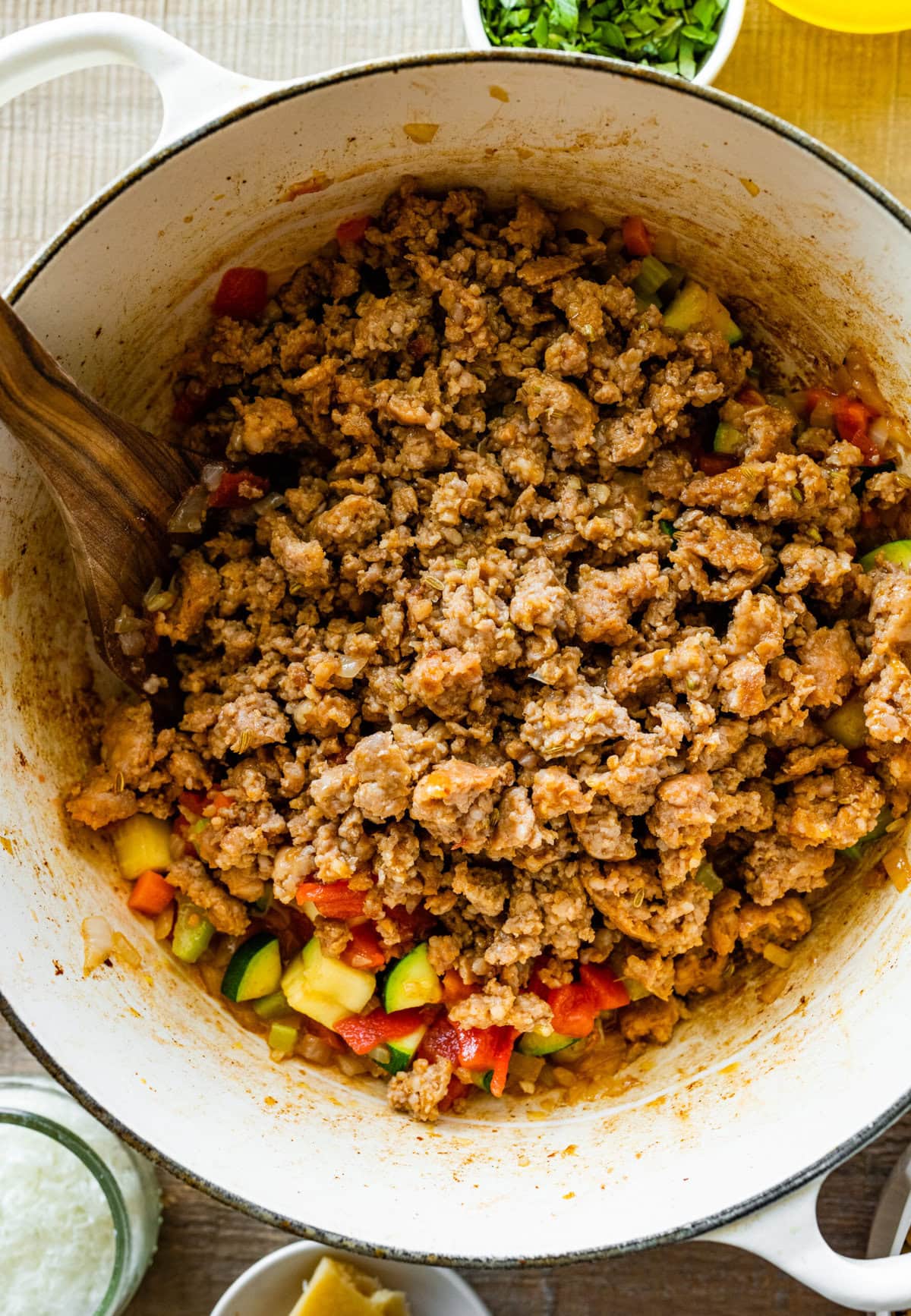 How to make sausage lentil soup (Italian recipe) step-by-step: add the sausage back to the pan.