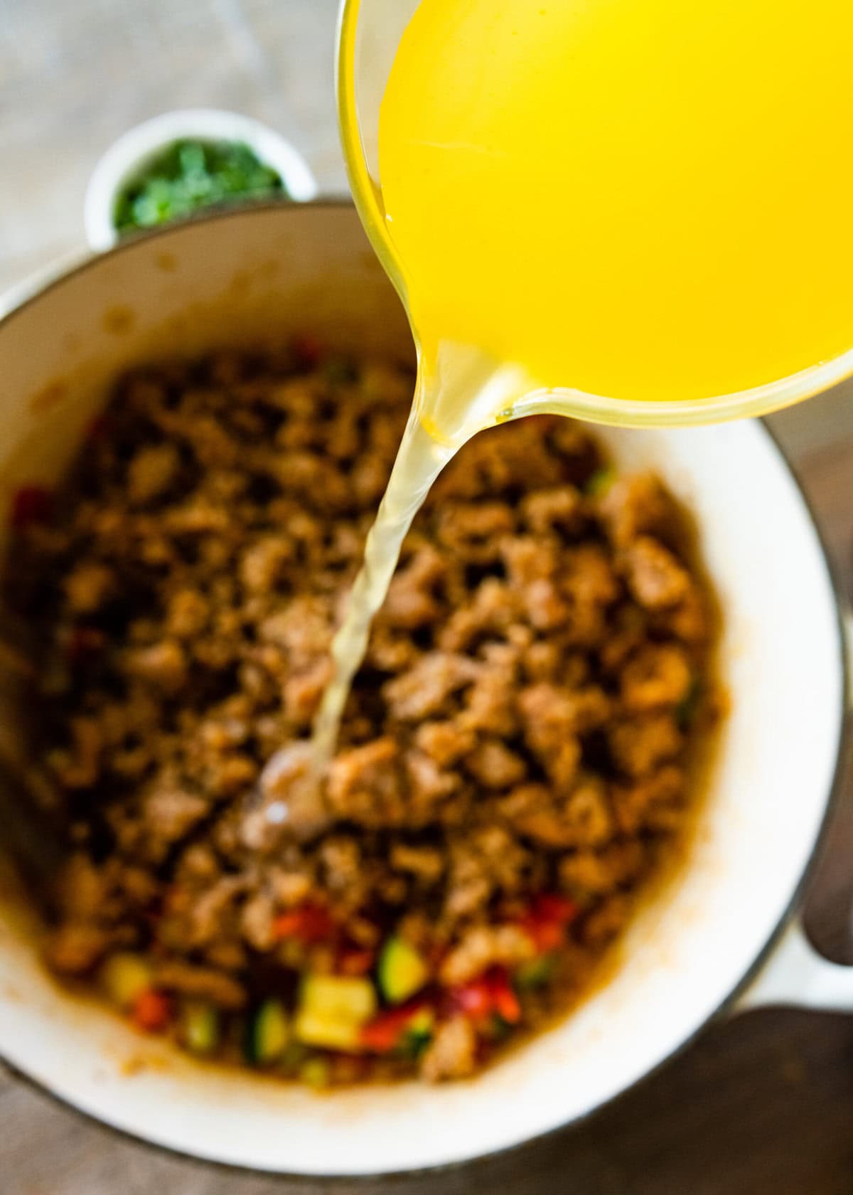 How to make sausage lentil soup (Italian recipe) step-by-step: pour the broth into the pot.