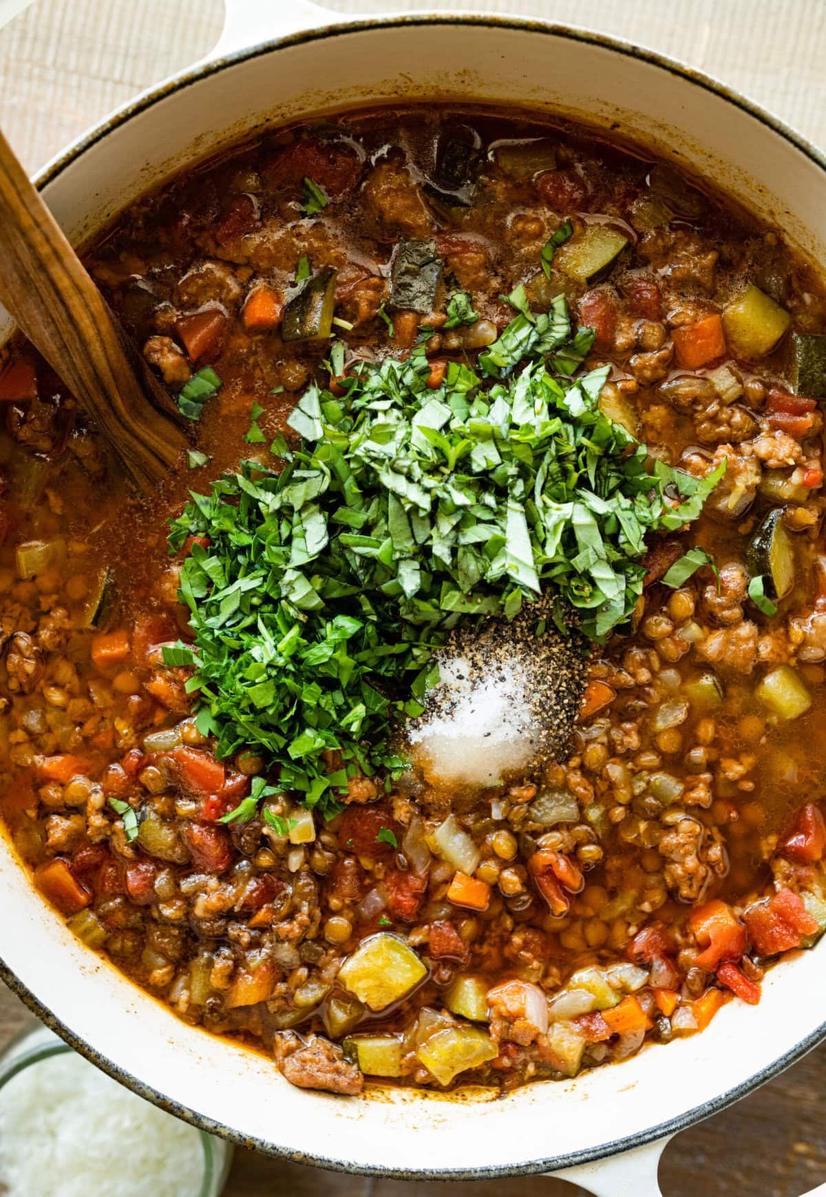 How to make sausage lentil soup (Italian recipe) step-by-step: add parsley and salt and pepper.