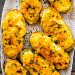 Best Twice Baked Potatoes Recipe on a white serving platter.