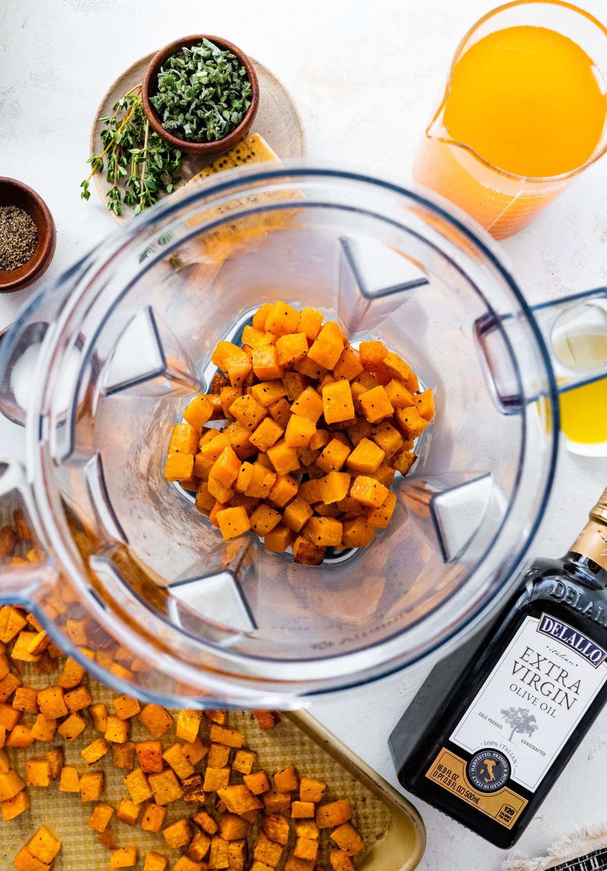 How to make Butternut Squash Orzo Recipe Step-by-step: puree half of the butternut squash.