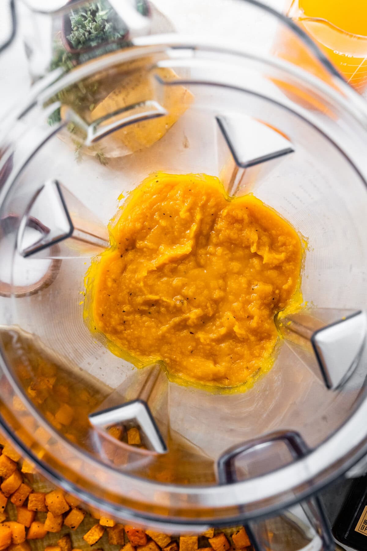How to make Butternut Squash Orzo Recipe Step-by-step: puree half of the butternut squash in a blender until smooth.