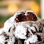 Cookies on a platter with a bite taken out of one cookie.