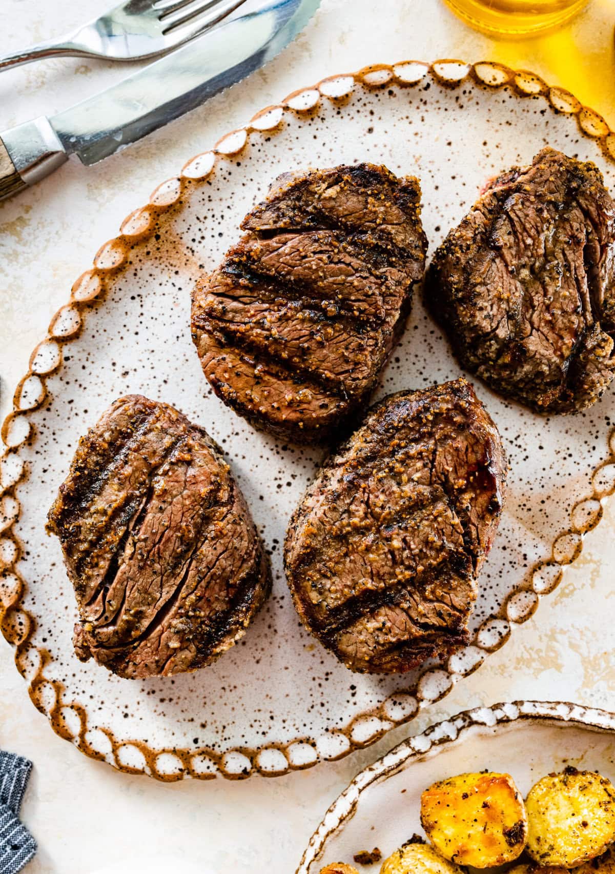 Grilled Filet Mignon Recipe on a serving platter.